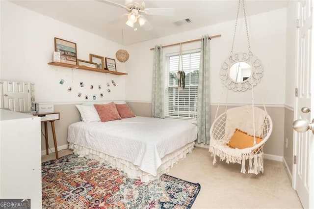 bedroom with radiator heating unit, baseboards, and visible vents