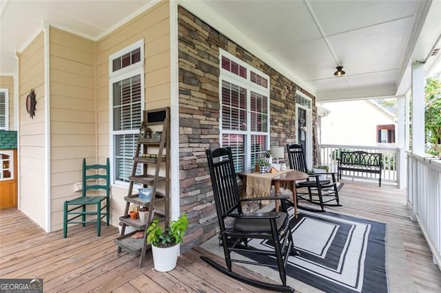 wooden terrace with covered porch