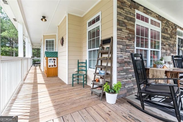 deck featuring a porch