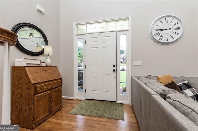 foyer entrance featuring light wood-type flooring