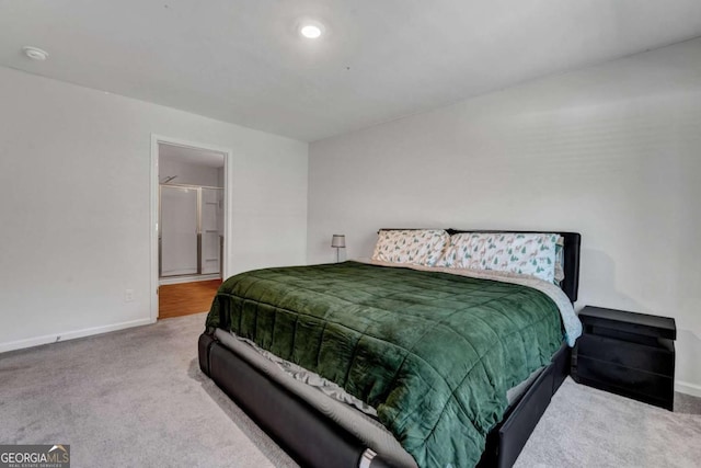 carpeted bedroom featuring recessed lighting and baseboards