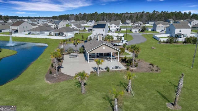 aerial view featuring a residential view and a water view