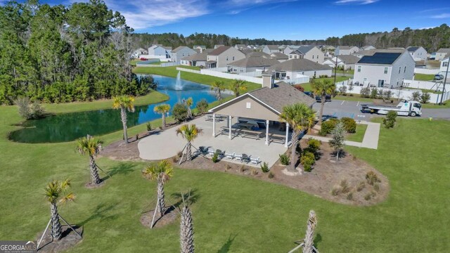 aerial view with a residential view and a water view