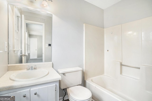 bathroom with toilet and vanity