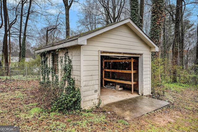 detached garage with fence