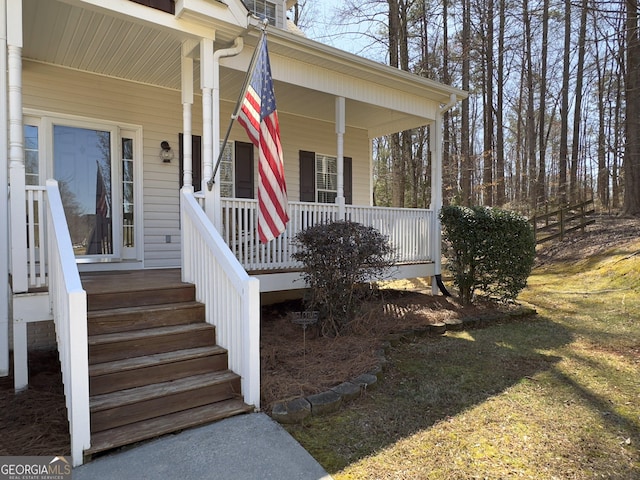 property entrance featuring covered porch