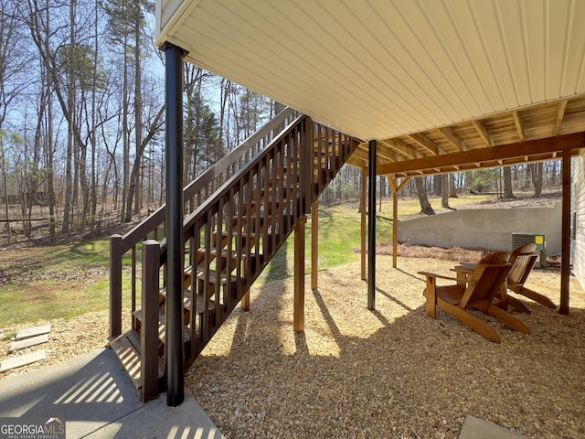 view of patio / terrace featuring stairs and central AC