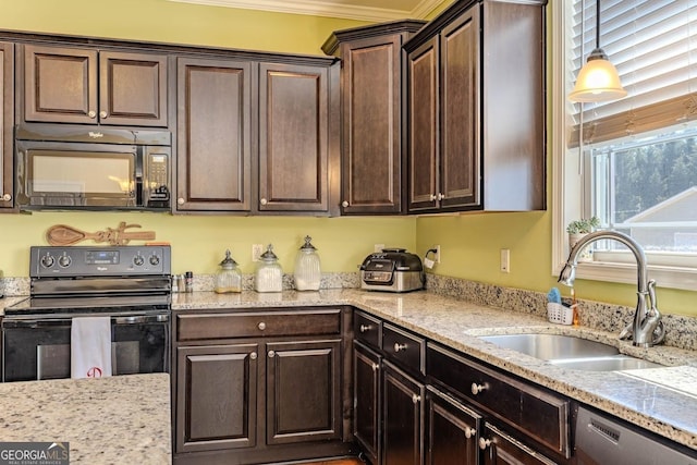18 Vernon Rd NE, Rome, GA 30165 - kitchen with black appliances, a sink, dark brown cabinetry, light stone counters, and hanging light fixtures