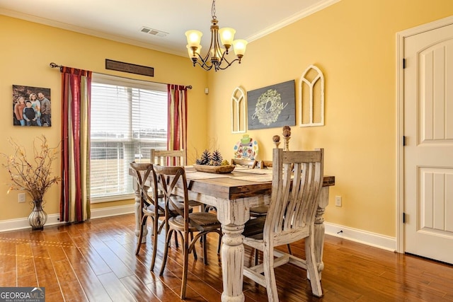 18 Vernon Rd NE, Rome, GA 30165 - dining space with a chandelier, wood finished floors, baseboards, and ornamental molding