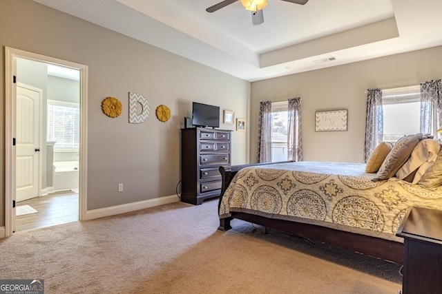 18 Vernon Rd NE, Rome, GA 30165 - bedroom with carpet floors, multiple windows, baseboards, and connected bathroom