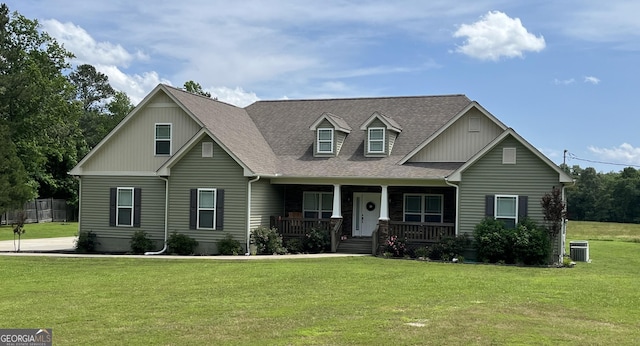 18 Vernon Rd NE, Rome, GA 30165 - view of front facade with covered porch, central AC unit, a front lawn, and a shingled roof