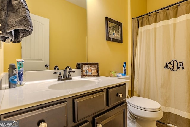 18 Vernon Rd NE, Rome, GA 30165 - bathroom featuring vanity, toilet, and curtained shower