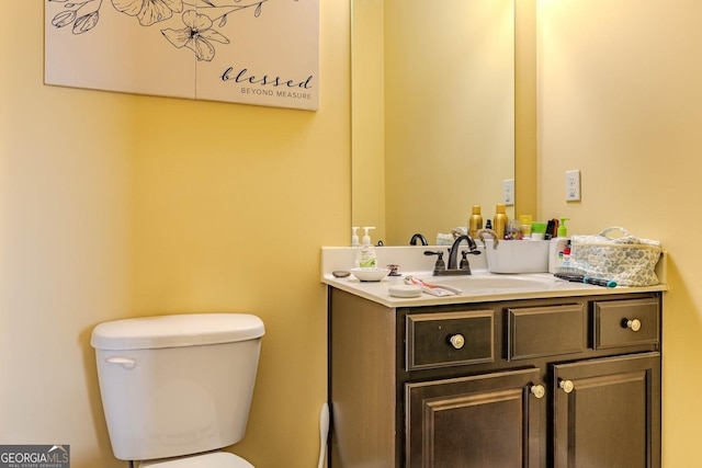 18 Vernon Rd NE, Rome, GA 30165 - half bathroom featuring toilet and vanity