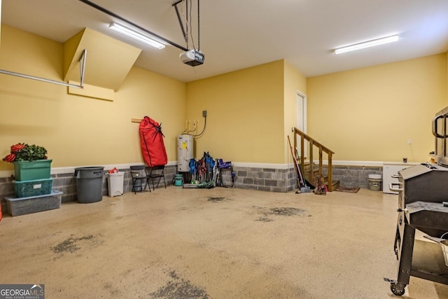 18 Vernon Rd NE, Rome, GA 30165 - garage with water heater, a garage door opener, and a wainscoted wall