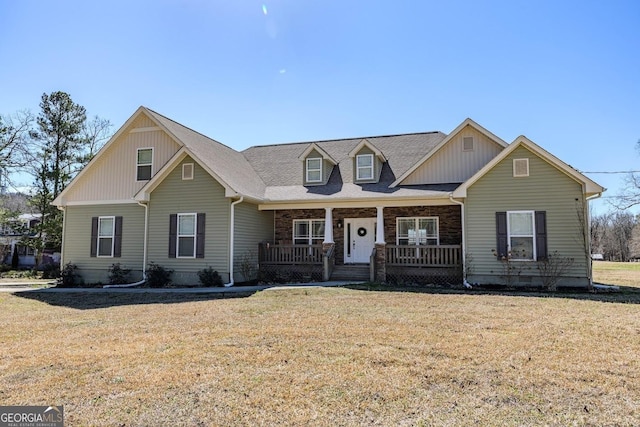 18 Vernon Rd NE, Rome, GA 30165 - view of front facade with a front lawn, covered porch, and roof with shingles