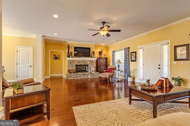 18 Vernon Rd NE, Rome, GA 30165 - living area featuring wood finished floors, a ceiling fan, baseboards, crown molding, and a fireplace