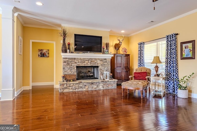18 Vernon Rd NE, Rome, GA 30165 - living area with crown molding, wood finished floors, baseboards, recessed lighting, and a stone fireplace