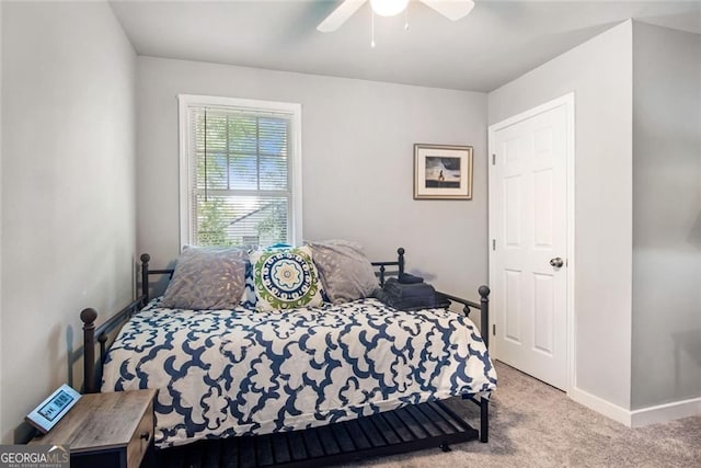 1041 Lawton Ave SW, Atlanta, GA 30310 - bedroom with baseboards, carpet floors, and ceiling fan