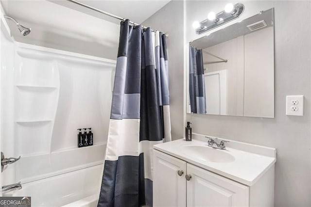 1041 Lawton Ave SW, Atlanta, GA 30310 - bathroom with vanity, shower / bath combo with shower curtain, and visible vents