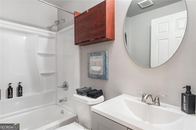 1041 Lawton Ave SW, Atlanta, GA 30310 - bathroom featuring vanity, toilet, visible vents, and shower / bathtub combination