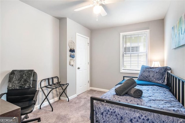 1041 Lawton Ave SW, Atlanta, GA 30310 - carpeted bedroom with a ceiling fan and baseboards