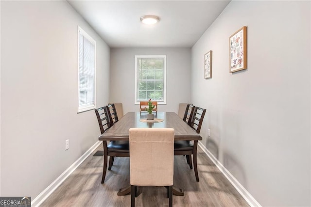 1041 Lawton Ave SW, Atlanta, GA 30310 - dining space with light wood-style floors and baseboards