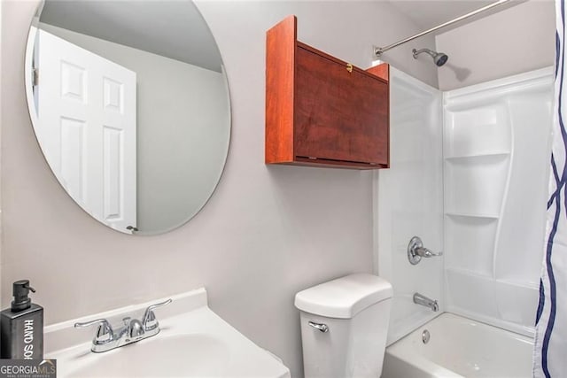 1041 Lawton Ave SW, Atlanta, GA 30310 - bathroom with toilet, shower / bath combo with shower curtain, and a sink