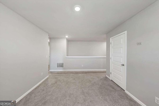 spare room featuring visible vents, recessed lighting, baseboards, and carpet floors