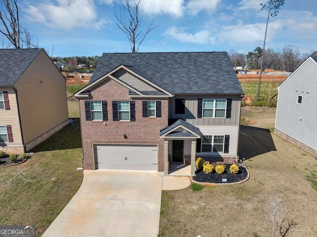 craftsman inspired home featuring brick siding, a front lawn, board and batten siding, and driveway