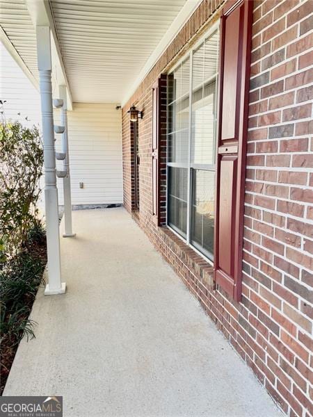 view of patio featuring a porch