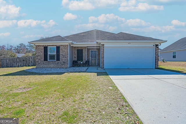 single story home with brick siding, fence, a front yard, a garage, and driveway