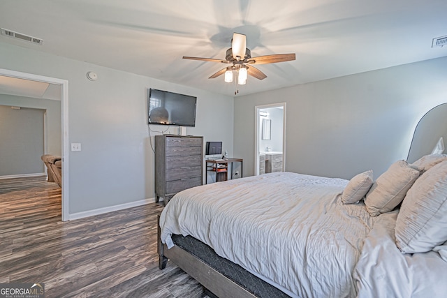 bedroom featuring visible vents, a ceiling fan, dark wood-type flooring, and baseboards