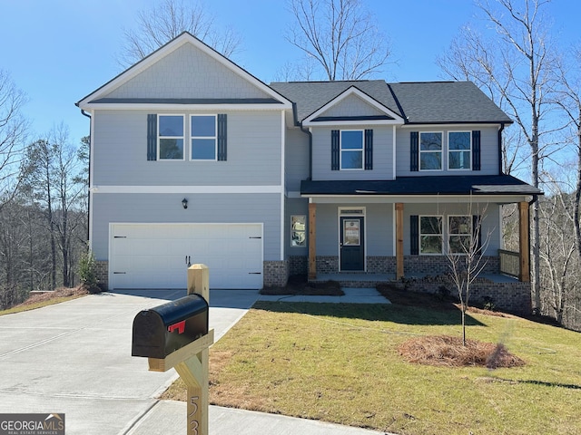 view of front of house featuring a front lawn, an attached garage, covered porch, and driveway