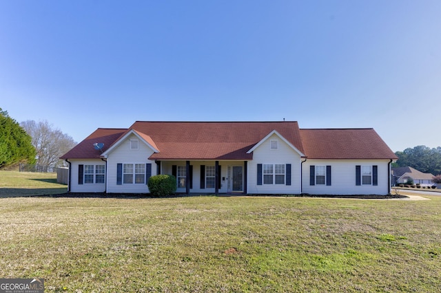 view of front of home featuring a front yard