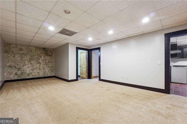 carpeted spare room featuring recessed lighting, a paneled ceiling, and baseboards