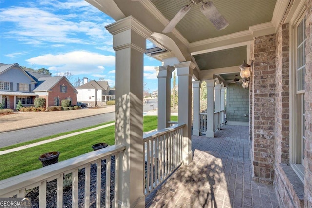 view of patio featuring a residential view and a porch