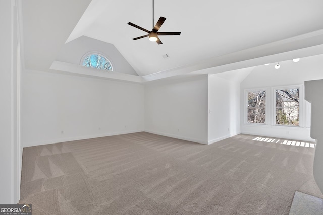 interior space featuring baseboards, carpet floors, and ceiling fan