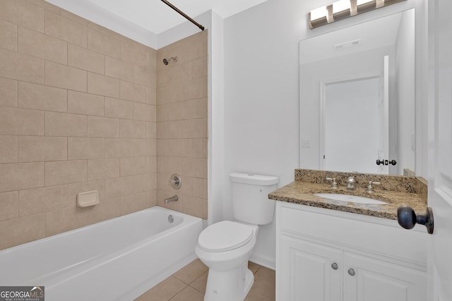 full bathroom featuring visible vents, toilet, shower / washtub combination, tile patterned flooring, and vanity