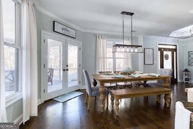 dining area with french doors, baseboards, dark wood finished floors, and crown molding