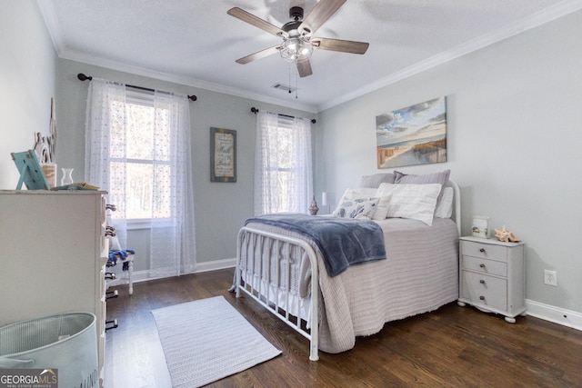 bedroom featuring visible vents, ceiling fan, baseboards, ornamental molding, and wood finished floors