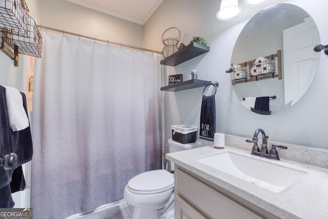 bathroom with vanity, curtained shower, toilet, and ornamental molding