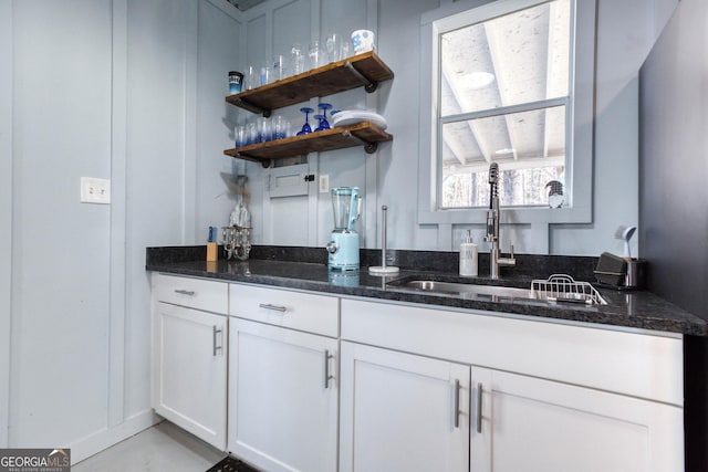 bar featuring a sink and indoor wet bar