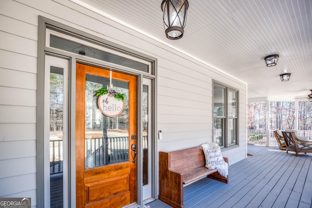 doorway to property with covered porch