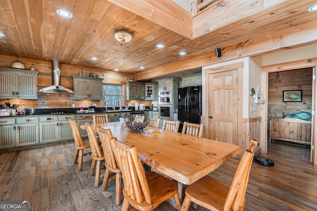 dining area with dark wood finished floors, wooden walls, recessed lighting, and wood ceiling