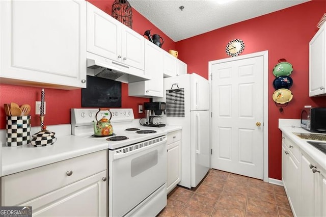 kitchen featuring under cabinet range hood, light countertops, white cabinets, white appliances, and a textured ceiling