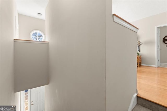 interior space featuring baseboards