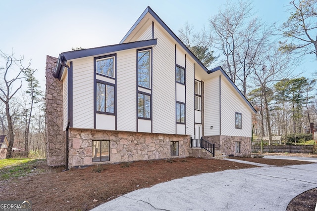 view of property exterior featuring stone siding