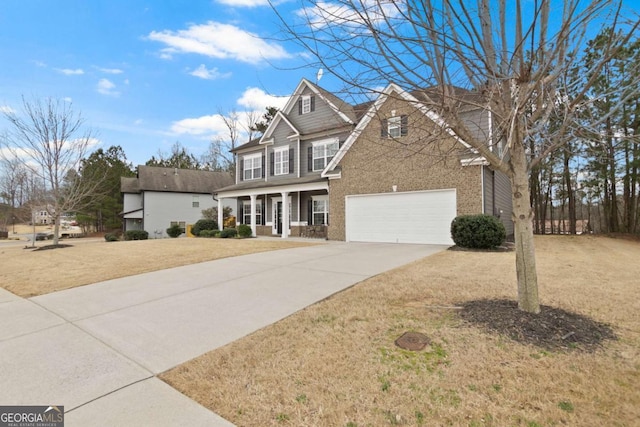 view of front of home featuring driveway, a porch, a front lawn, a garage, and brick siding