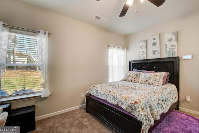 516 Grand Magnolia St, Jackson, GA 30233 - bedroom featuring baseboards, carpet floors, and ceiling fan