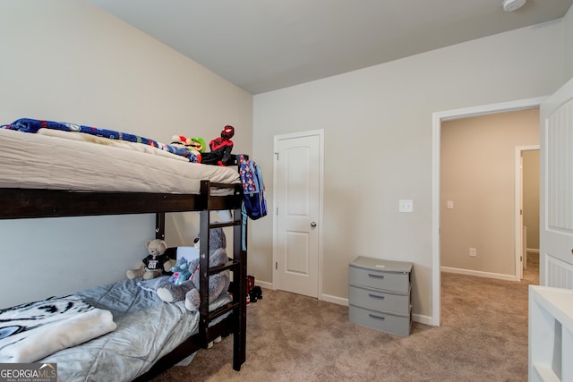 516 Grand Magnolia St, Jackson, GA 30233 - bedroom with light carpet and baseboards